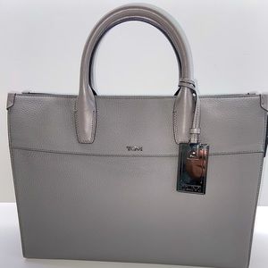 Tumi Grey Leather Briefcase. In excellent condition.